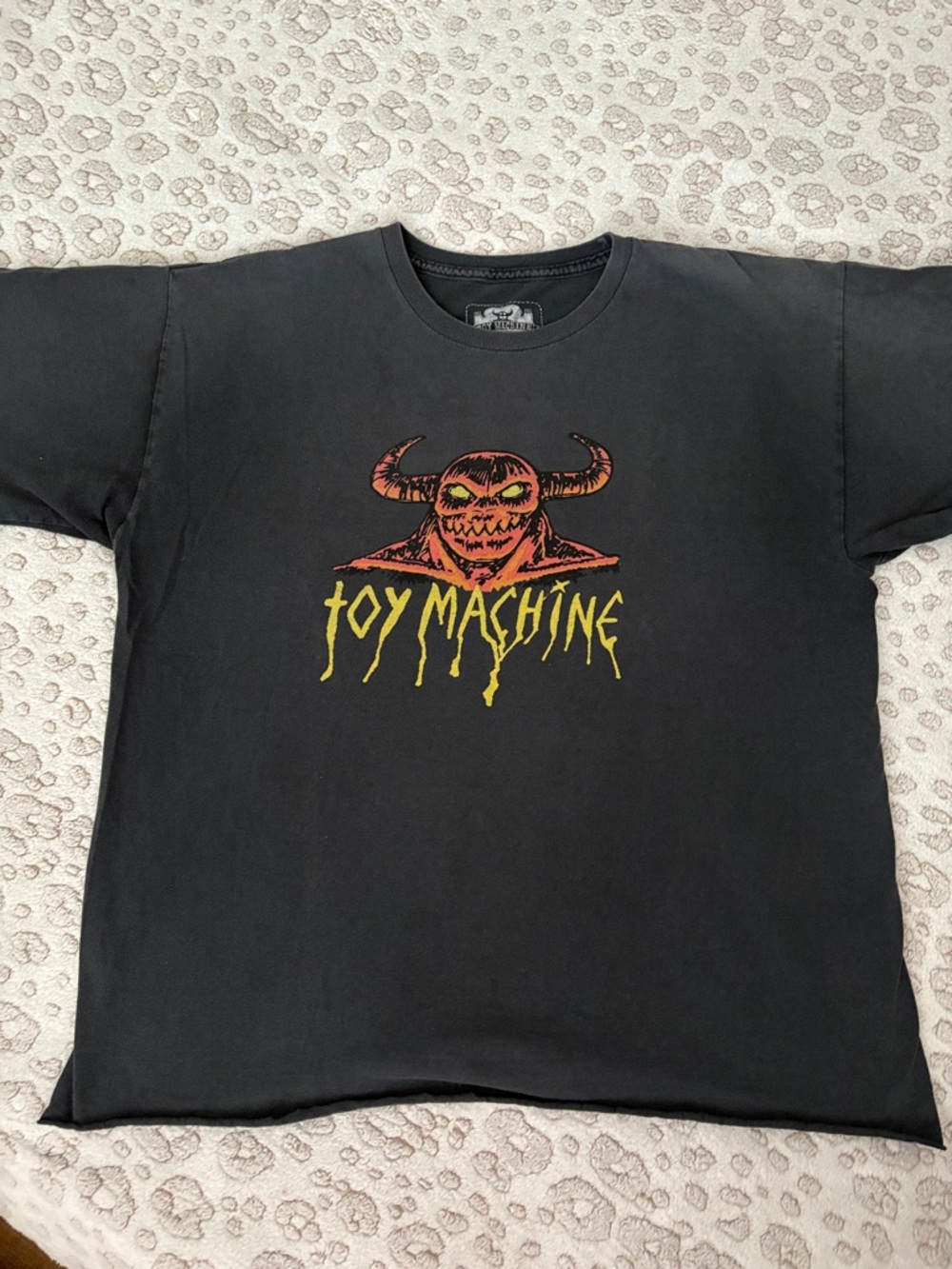 Machine Black Tee with Orange Monster and Yellow Logo